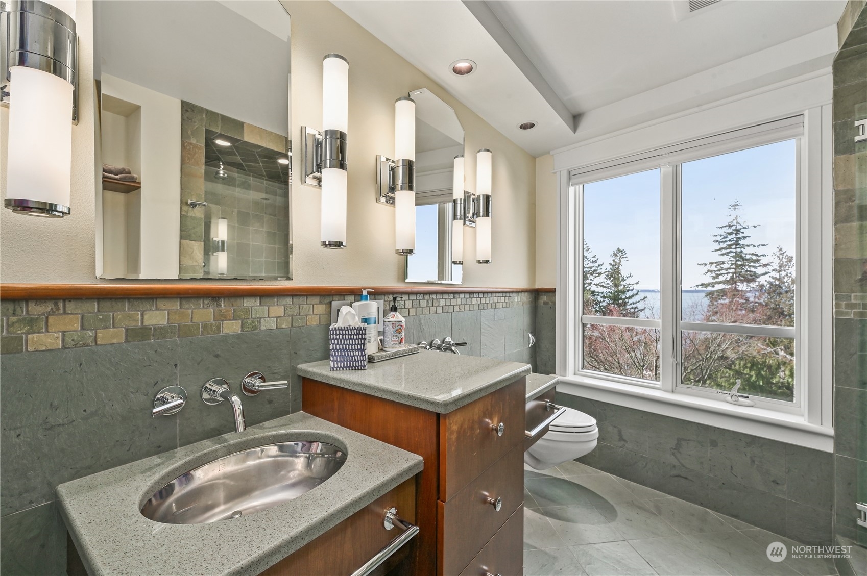 711 Briar Road Bellingham, WA 98225 - Photo 34 of 40 a bathroom with a sink and a mirror