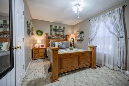 835 Spike Trail Murfreesboro, TN 37129 - Photo 12 of 24 a kitchen with stainless steel appliances granite countertop a stove a refrigerator and a dining table
