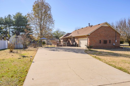835 Spike Trail Murfreesboro, TN 37129 - Photo 16 of 24 a view of white house with a yard