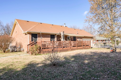 835 Spike Trail Murfreesboro, TN 37129 - Photo 20 of 24 a view of a white house with a yard patio and fire pit
