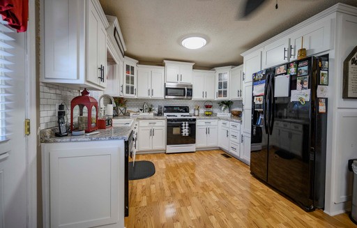 835 Spike Trail Murfreesboro, TN 37129 - Photo 7 of 24 a kitchen with stainless steel appliances granite countertop a refrigerator a stove top oven a sink and dishwasher