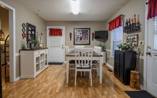 835 Spike Trail Murfreesboro, TN 37129 - Photo 8 of 24 a view of a dining room with furniture and wooden floor