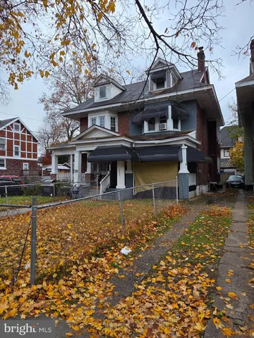 a view of a house with a swimming pool