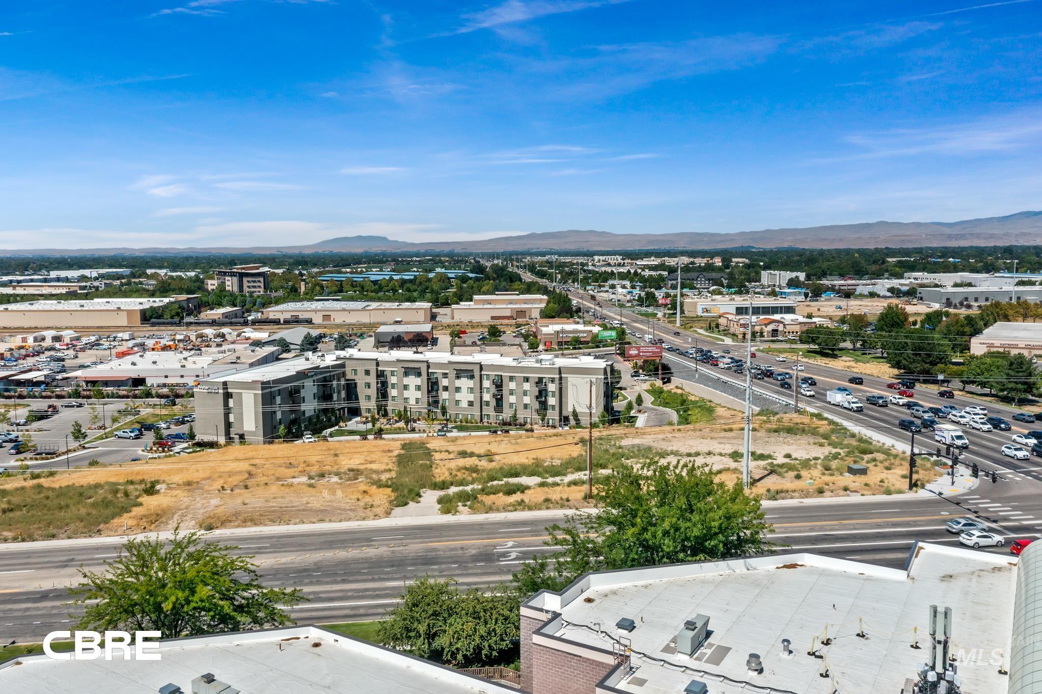 3070 East Franklin Road Meridian, ID 83642 - Photo 10 of 18 Drone / aerial view of a mountain backdrop