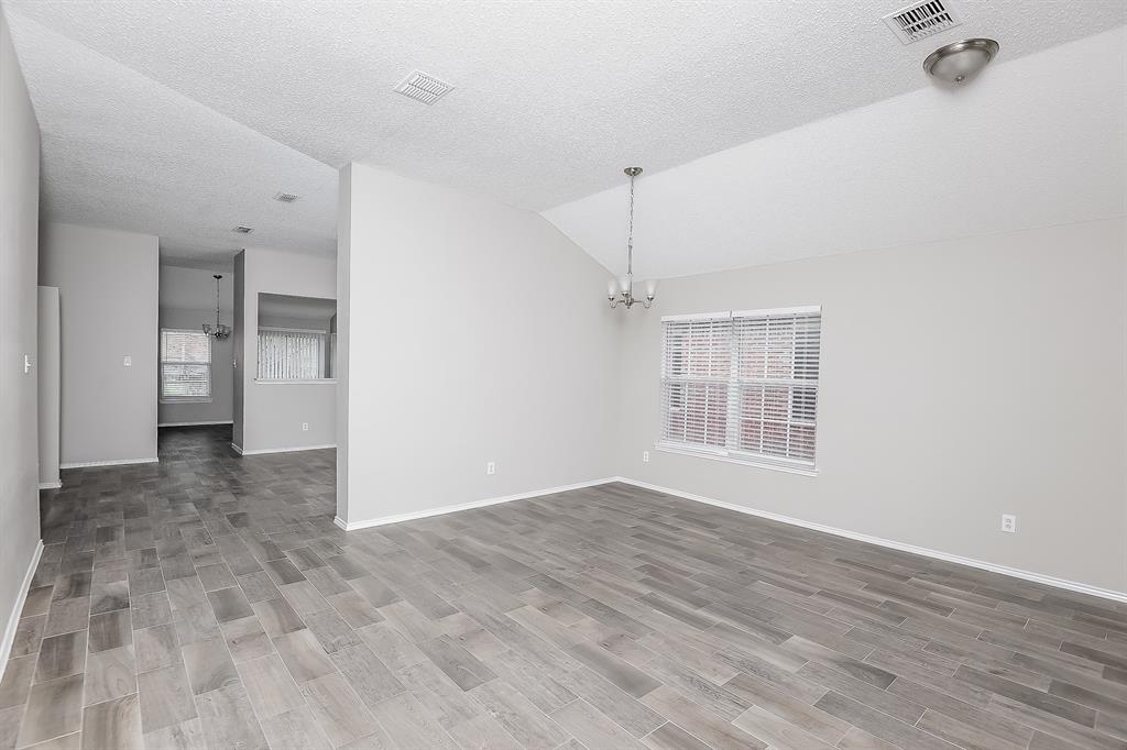 7417 Snow Ridge Drive Fort Worth, TX 76133 - Photo 4 of 16 a view of an empty room with a window