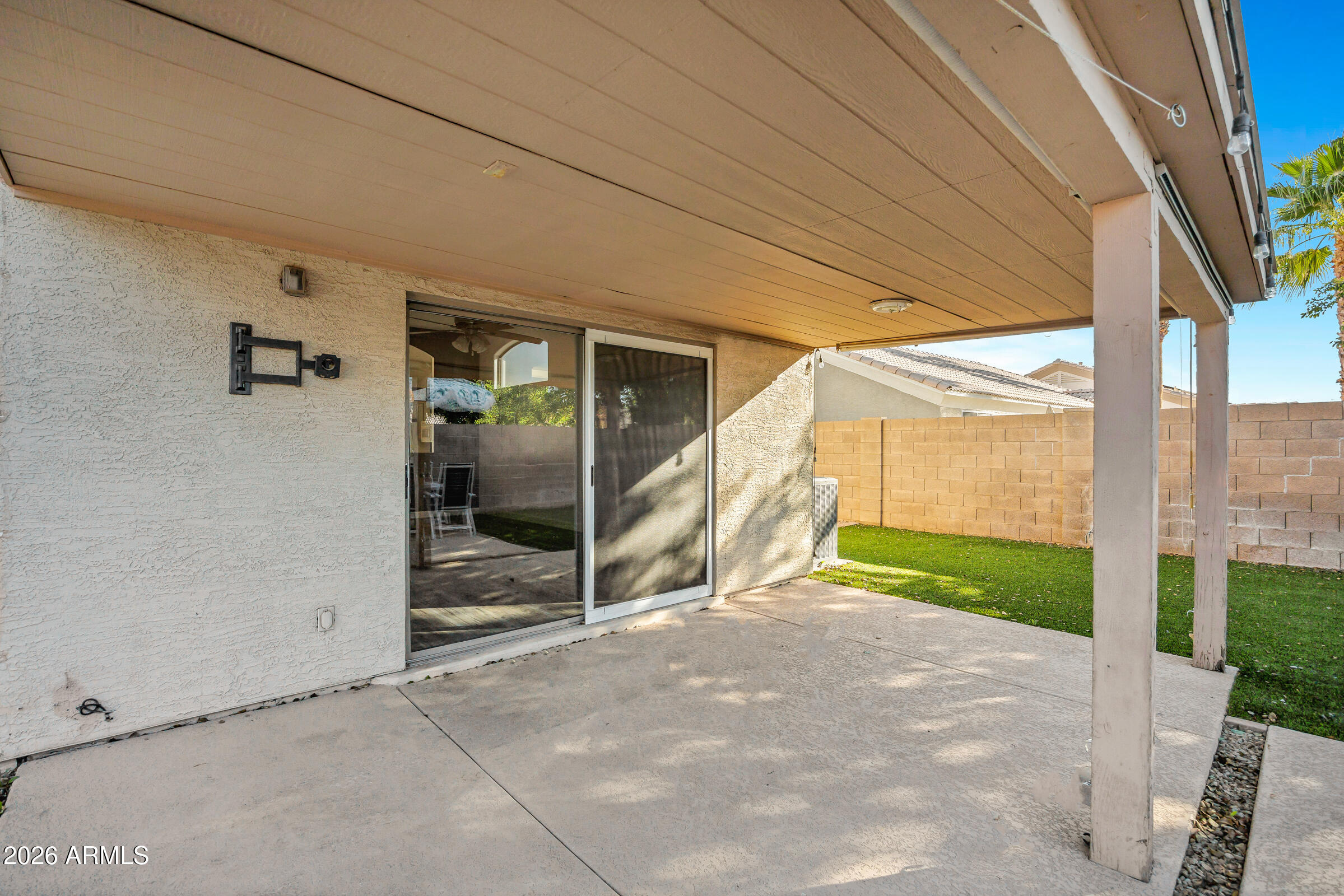 56 South Monterey Street Gilbert, AZ 85233 - Photo 26 of 30 a view of a house with a backyard