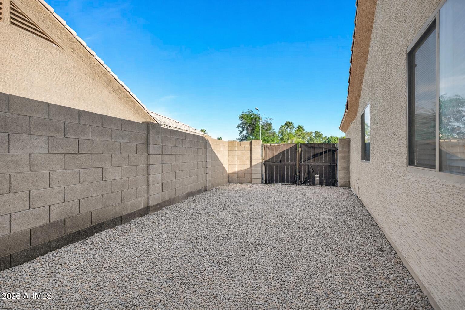 56 South Monterey Street Gilbert, AZ 85233 - Photo 6 of 30 a view of a backyard