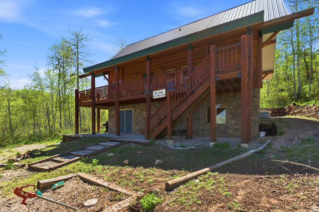 2096 South Aspen Ridge Coalville, UT 84017 - Photo 40 of 44 Two-story log cabin with stone foundation