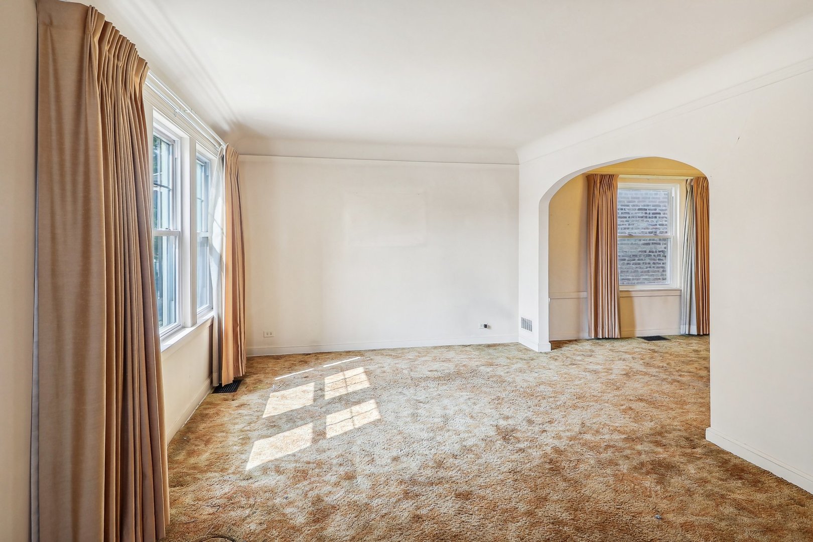 6014 West Fletcher Street Chicago, IL 60634 - Photo 5 of 28 a view of an empty room with a window
