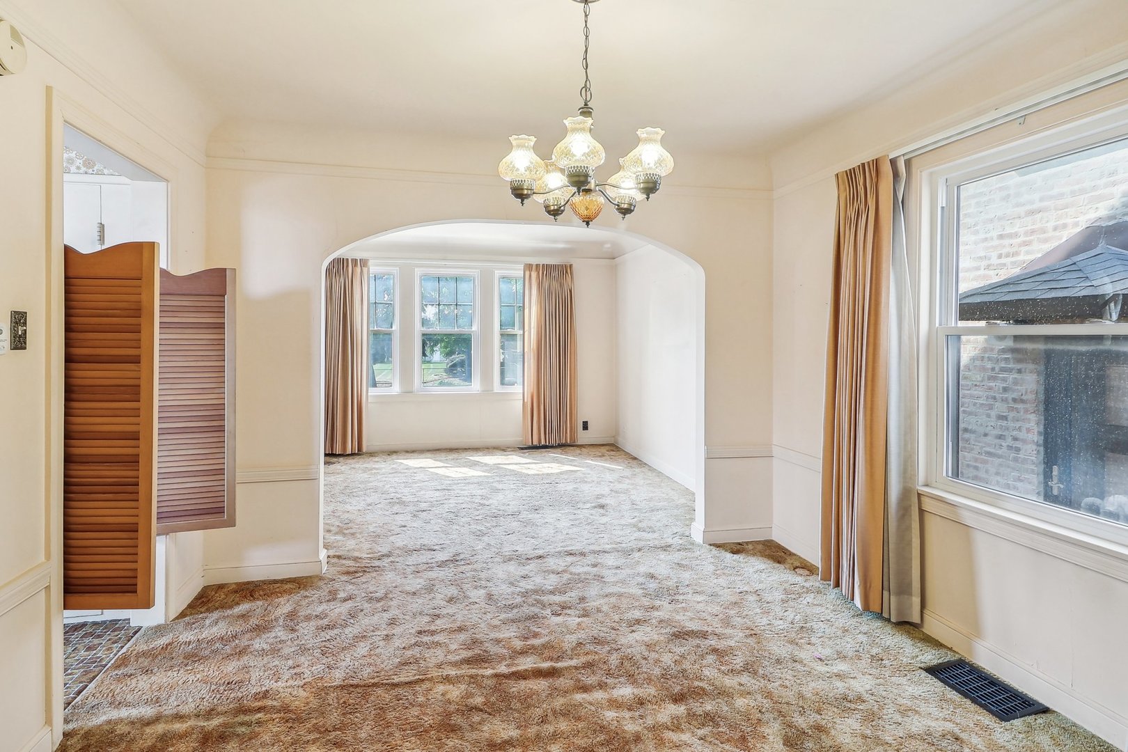 6014 West Fletcher Street Chicago, IL 60634 - Photo 7 of 28 a view of an empty room with a window