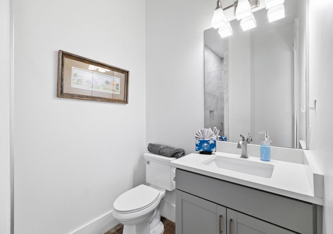151 Snowdrift Road Miramar Beach, FL 32550 - Photo 16 of 50 a bathroom with a sink vanity mirror and toilet