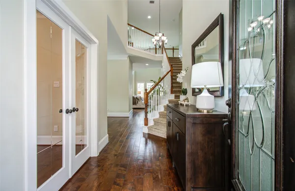 a very nice looking room with wooden floor