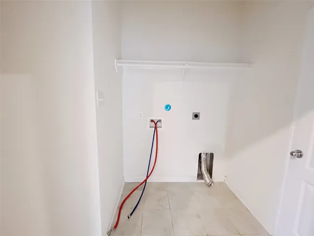 a bathroom with a tub a sink and a mirror