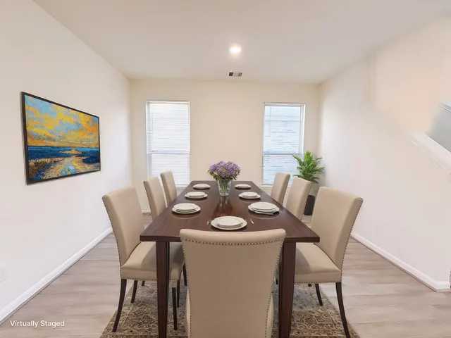 a spacious bedroom with a bed and a window