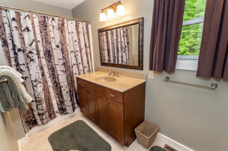 2226 County Line Road Champion, PA 15622 - Photo 30 of 33 a bathroom with a sink and a mirror