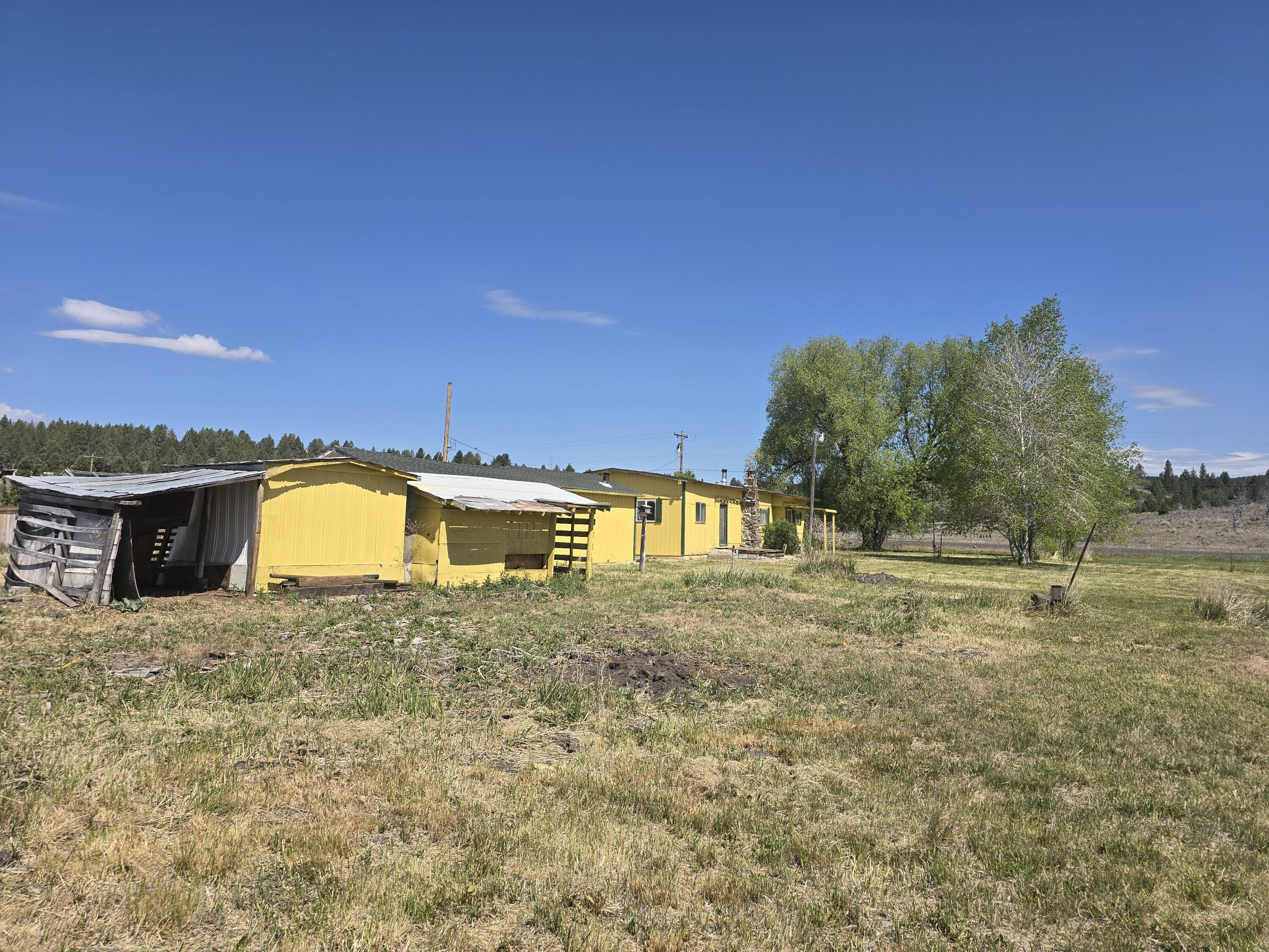 31974 Drews Road Chiloquin, OR 97624 - Photo 21 of 25 a view of a house with a yard