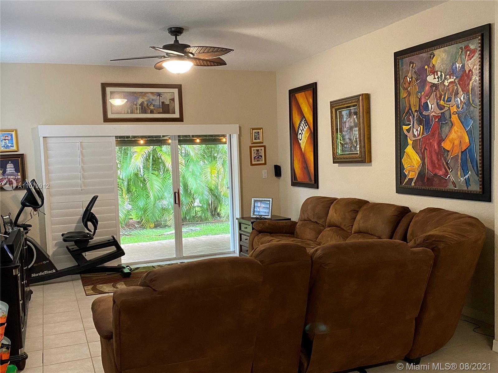 West Kendall Miami, FL 33193 - Photo 6 of 8 a living room with furniture and a large window