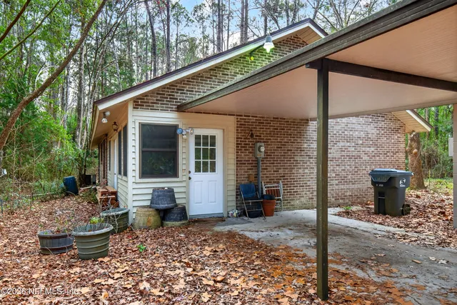 a backyard of a house with seating space