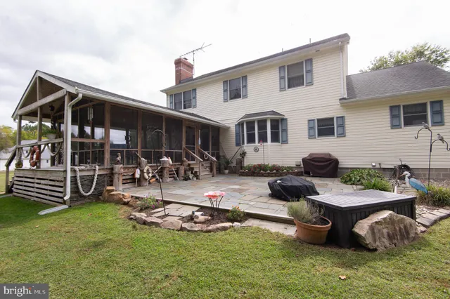 a front view of a house with patio