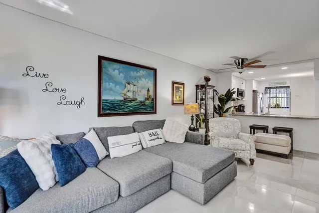 a living room with furniture and a couch