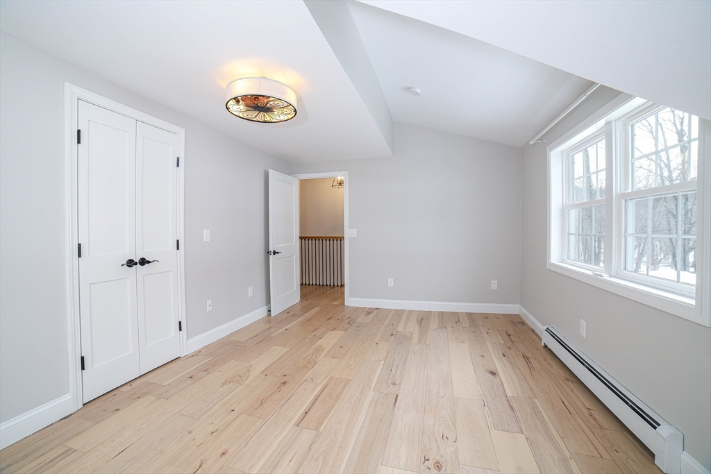3 Woods Road Westminster, MA 01473 - Photo 27 of 42 wooden floor in an empty room with a window
