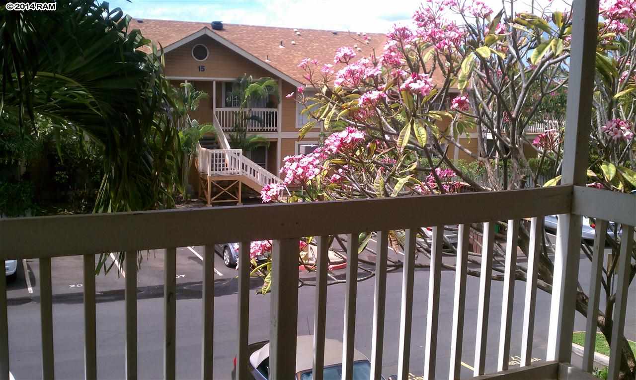 140 Uwapo Road, Unit 1201 Kihei, HI 96753 - Photo 5 of 8 a view of a wooden fence
