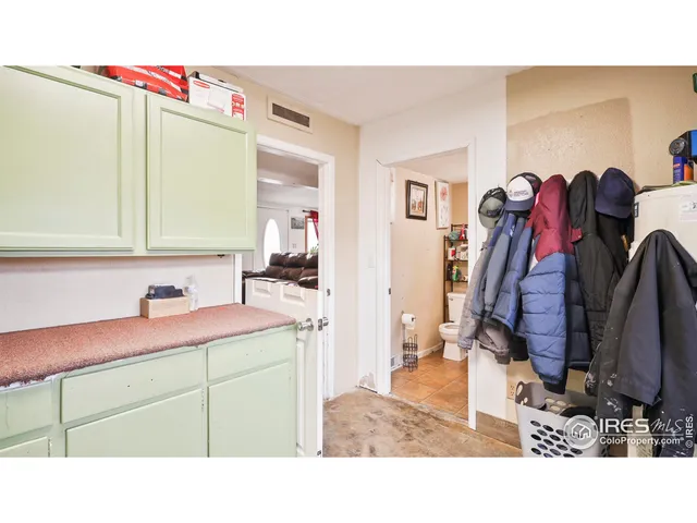 a bathroom with a sink vanity and mirror