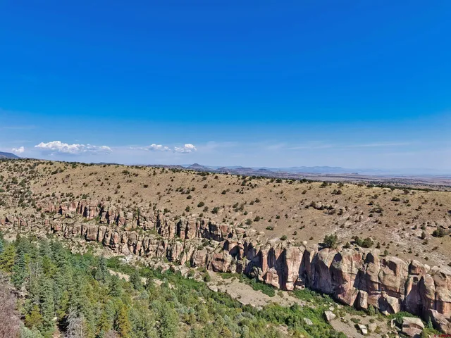 an aerial view of residential house and mountain view