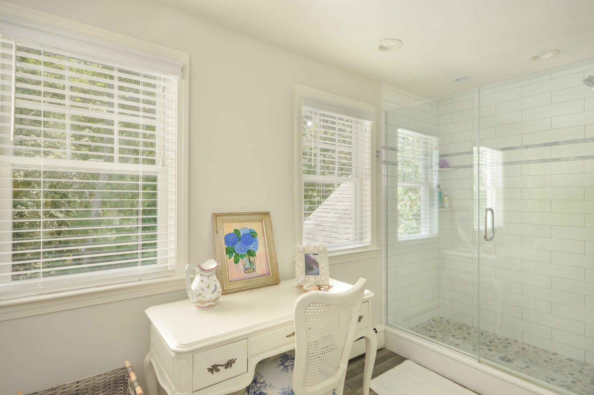 53 Hyde Road Centerville, MA 02632 - Photo 14 of 17 a bathroom with a sink a tub and a mirror