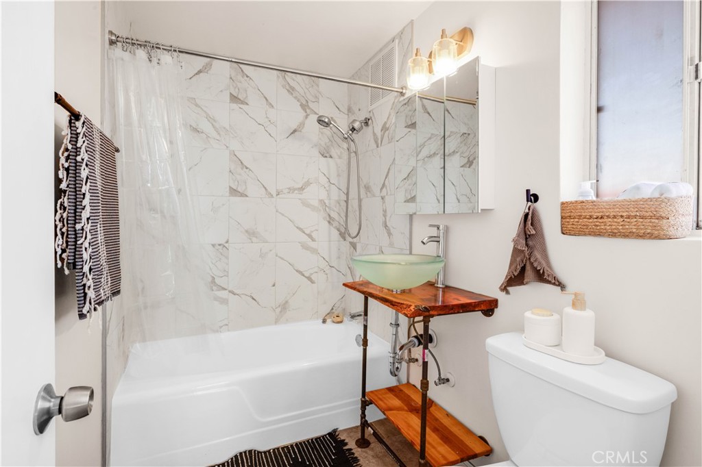 55850 Shannon Road Landers, CA 92285 - Photo 25 of 66 a bathroom with a bathtub and shower