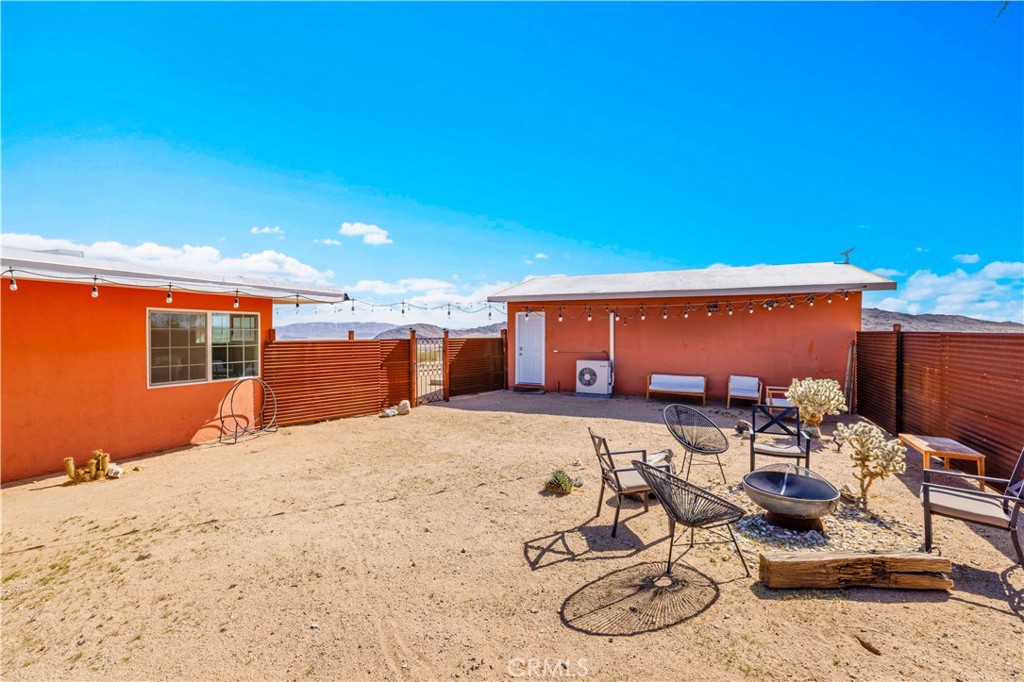 55850 Shannon Road Landers, CA 92285 - Photo 37 of 66 a view of a backyard with furniture and empty room