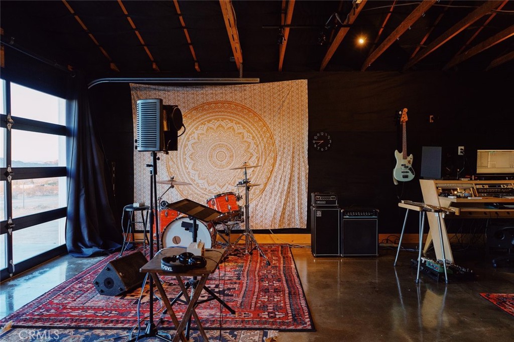 55850 Shannon Road Landers, CA 92285 - Photo 40 of 66 wooden floor with table and chairs