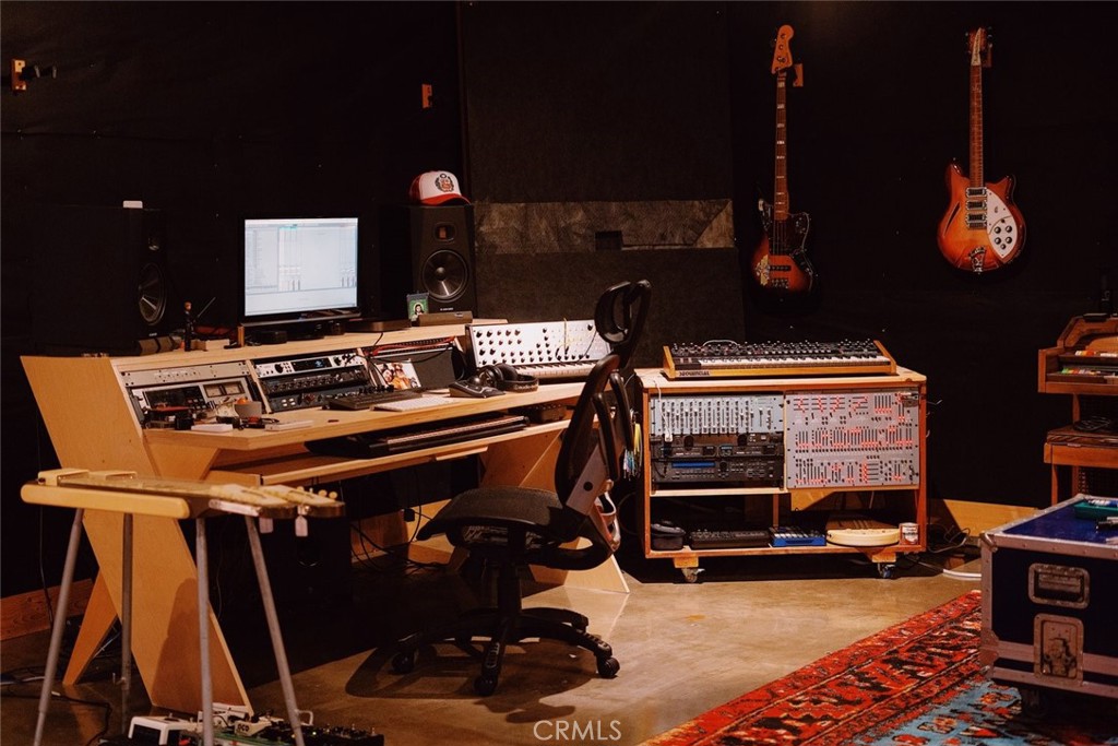 55850 Shannon Road Landers, CA 92285 - Photo 42 of 66 a room with furniture and a flat screen tv