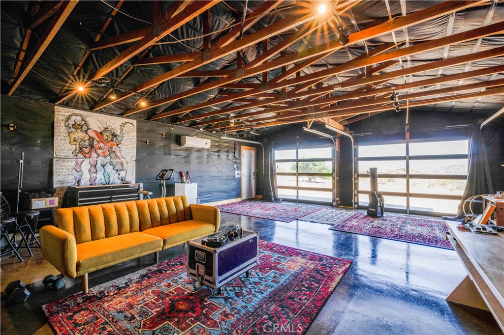 55850 Shannon Road Landers, CA 92285 - Photo 46 of 66 a outdoor living space with furniture and a rug