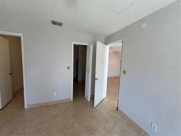 an empty room with closet