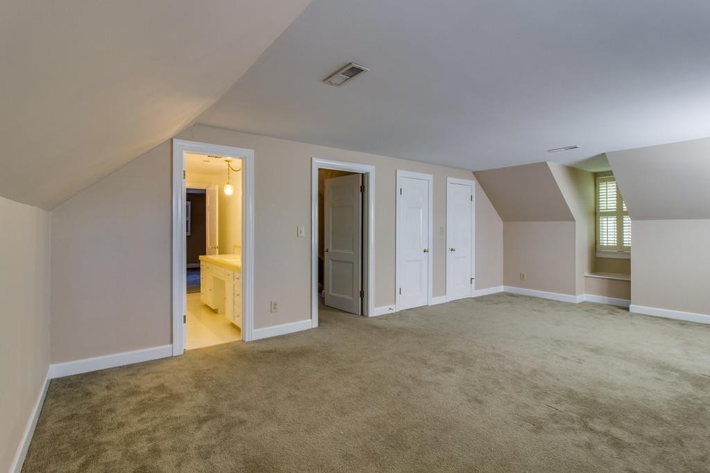 1501 Hillsboro Road Franklin, TN 37069 - Photo 18 of 24 a view of an empty room with a closet