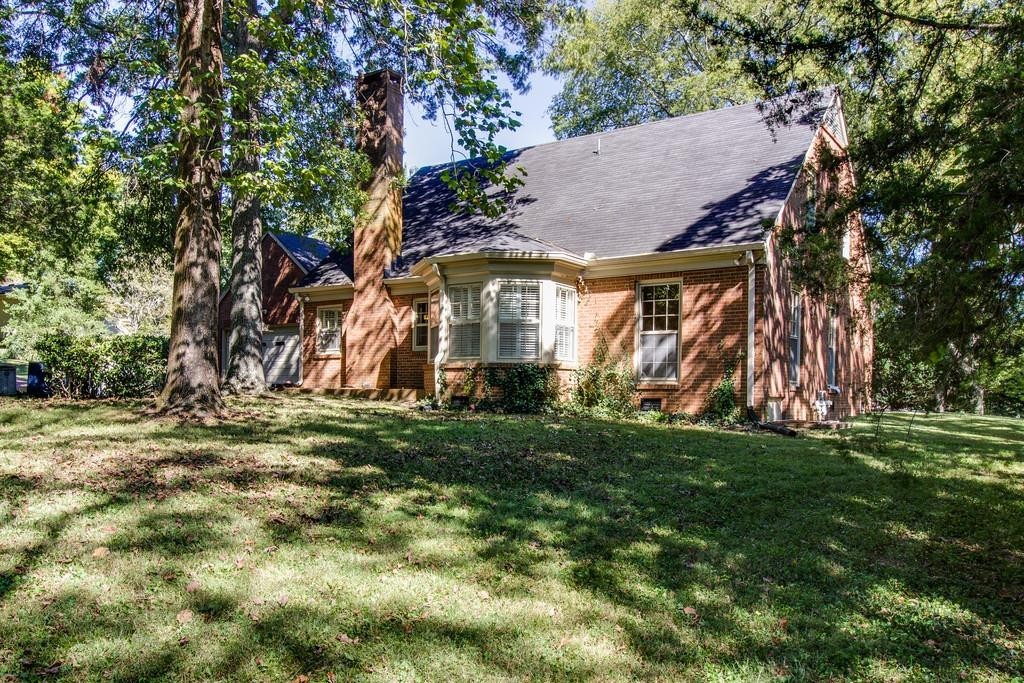 1501 Hillsboro Road Franklin, TN 37069 - Photo 22 of 24 a view of a house with a yard
