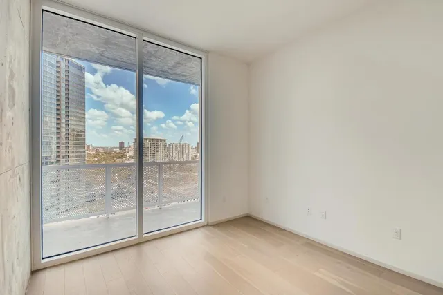 a view of an empty room and window