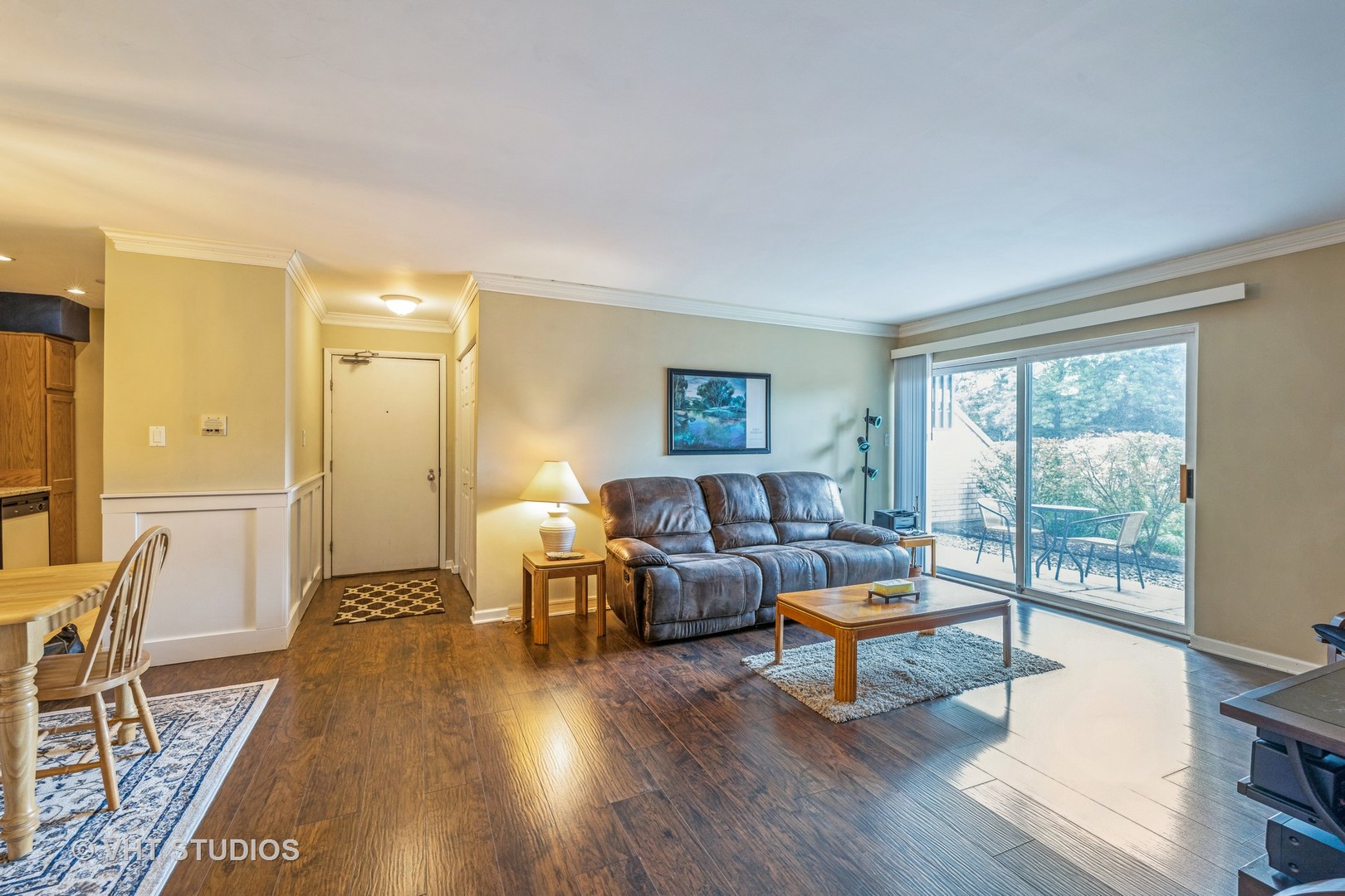 6135 Knoll Wood Road, Unit 13101 Willowbrook, IL 60527 - Photo 2 of 12 a living room with furniture and a wooden floor
