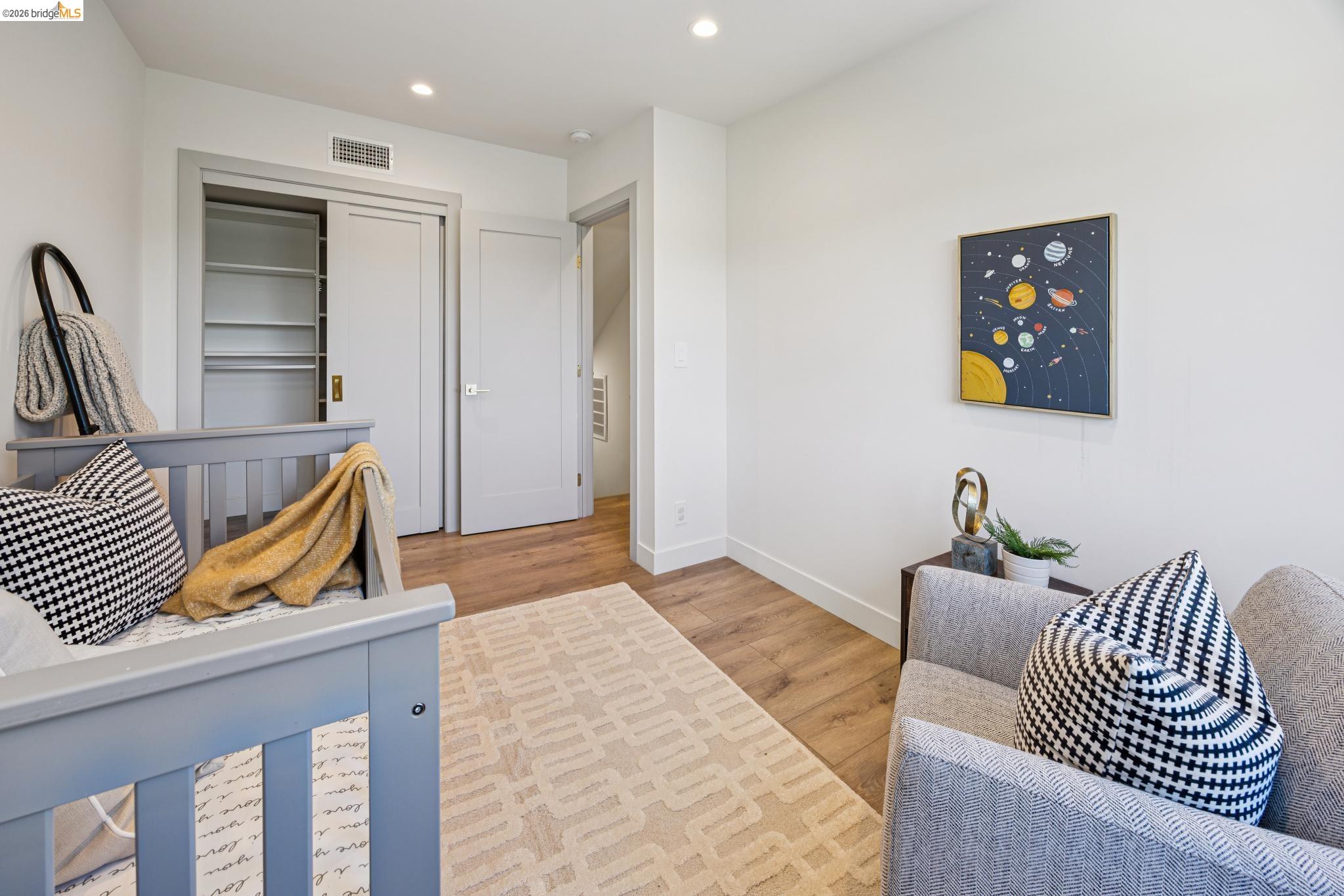 11 Belinda Court San Ramon, CA 94583 - Photo 29 of 33 Spacious room featuring wood-finish flooring, recessed lighting, and a built-in closet with shelving