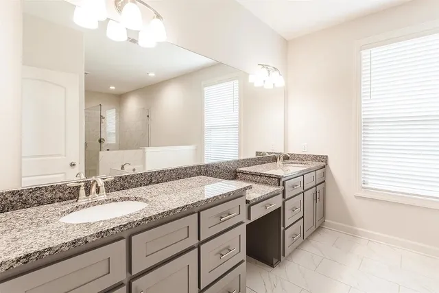 a view of staircase with wooden floor and fan