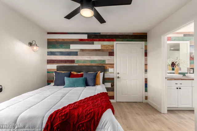 a bathroom with a double vanity sink and mirror