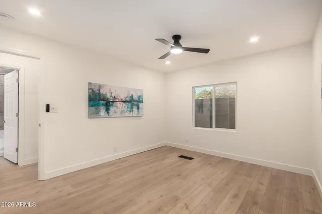 a view of a room with wooden walls