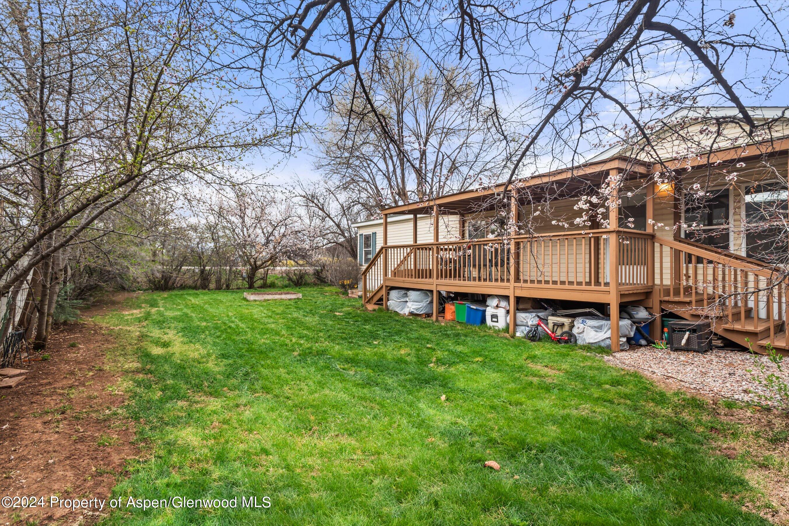 71 Nathan El Jebel, CO 81623 - Photo 2 of 29 a view of a house with a yard and sitting area