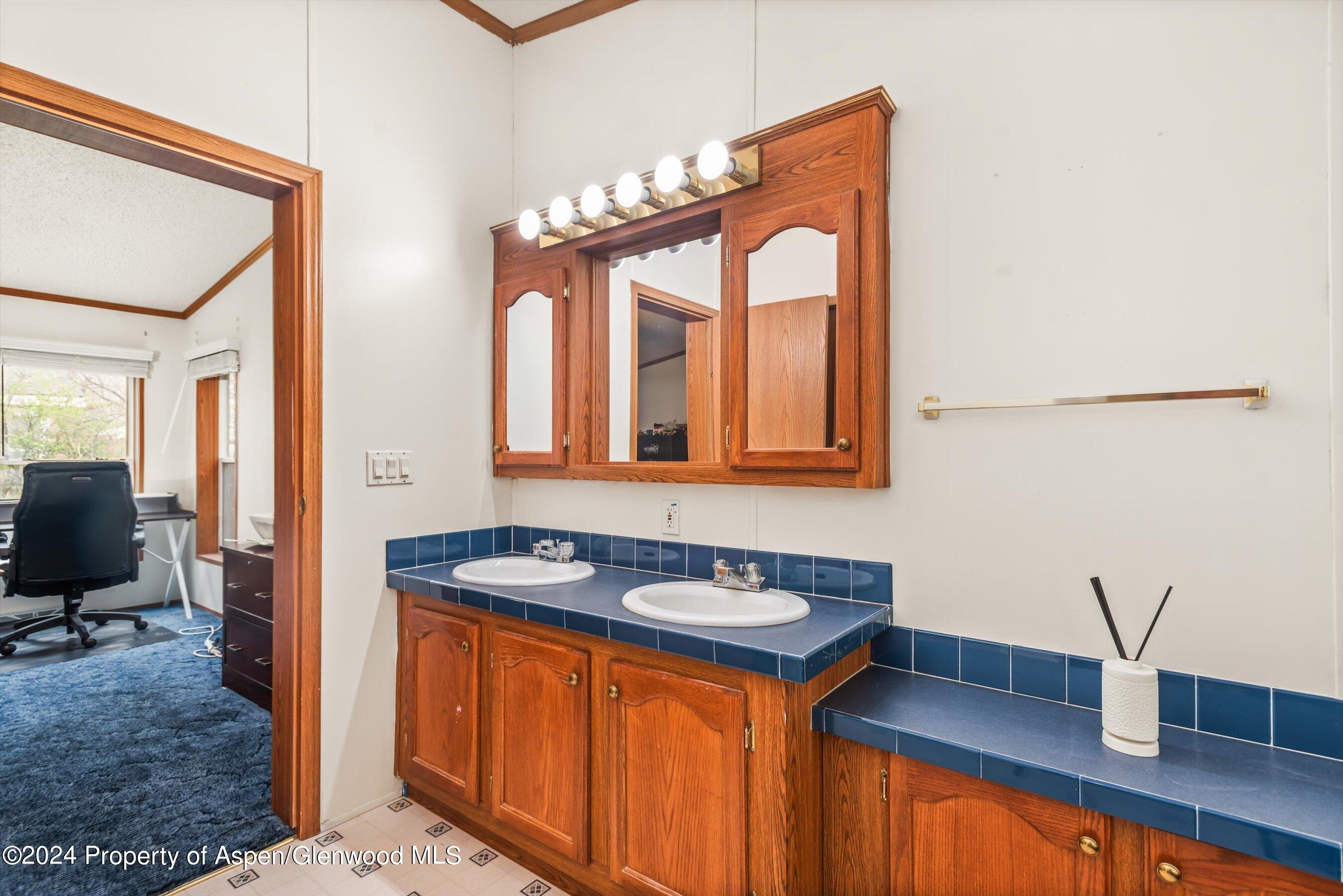 71 Nathan El Jebel, CO 81623 - Photo 21 of 29 a bathroom with a sink and a mirror
