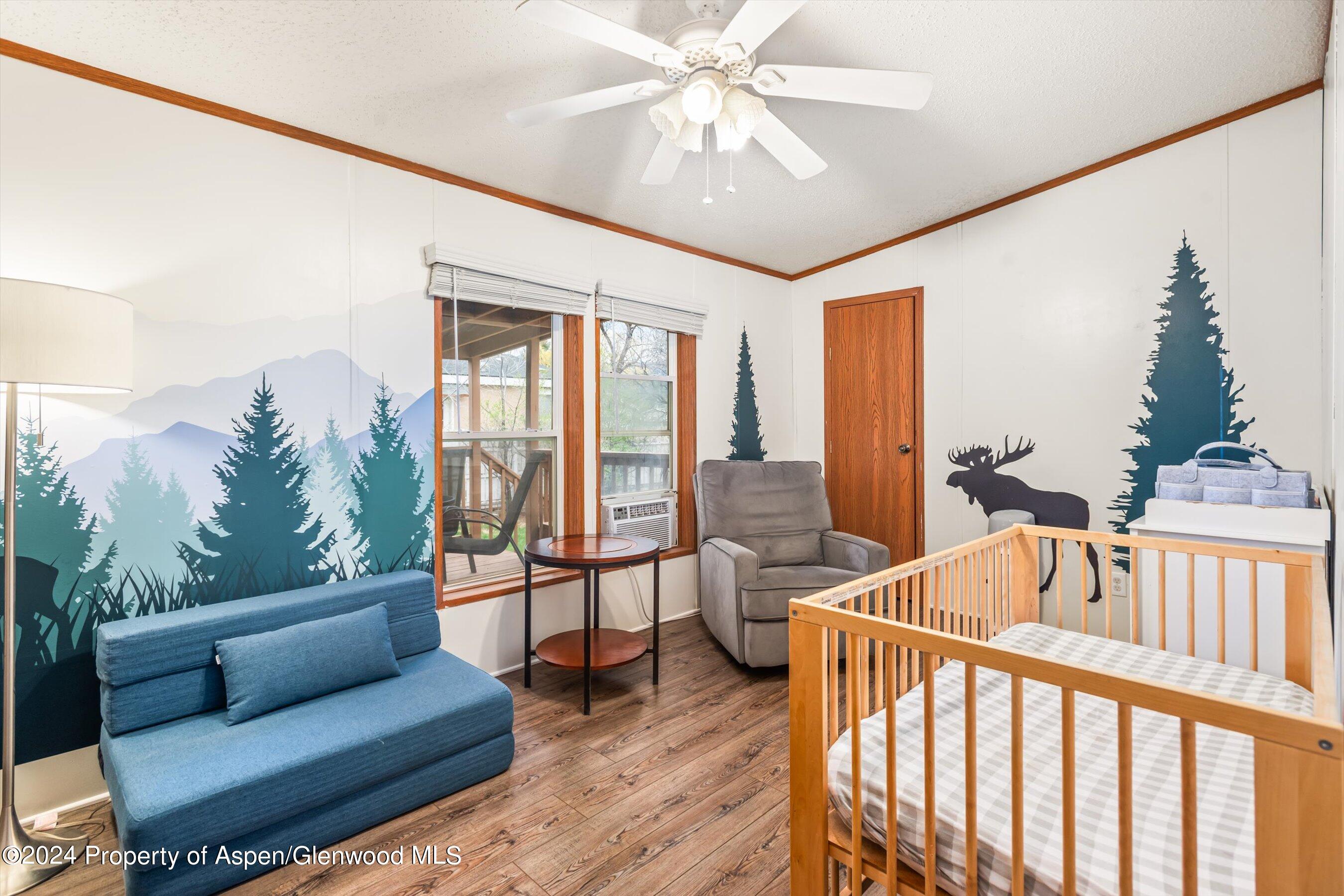71 Nathan El Jebel, CO 81623 - Photo 22 of 29 a living room with furniture and a large window