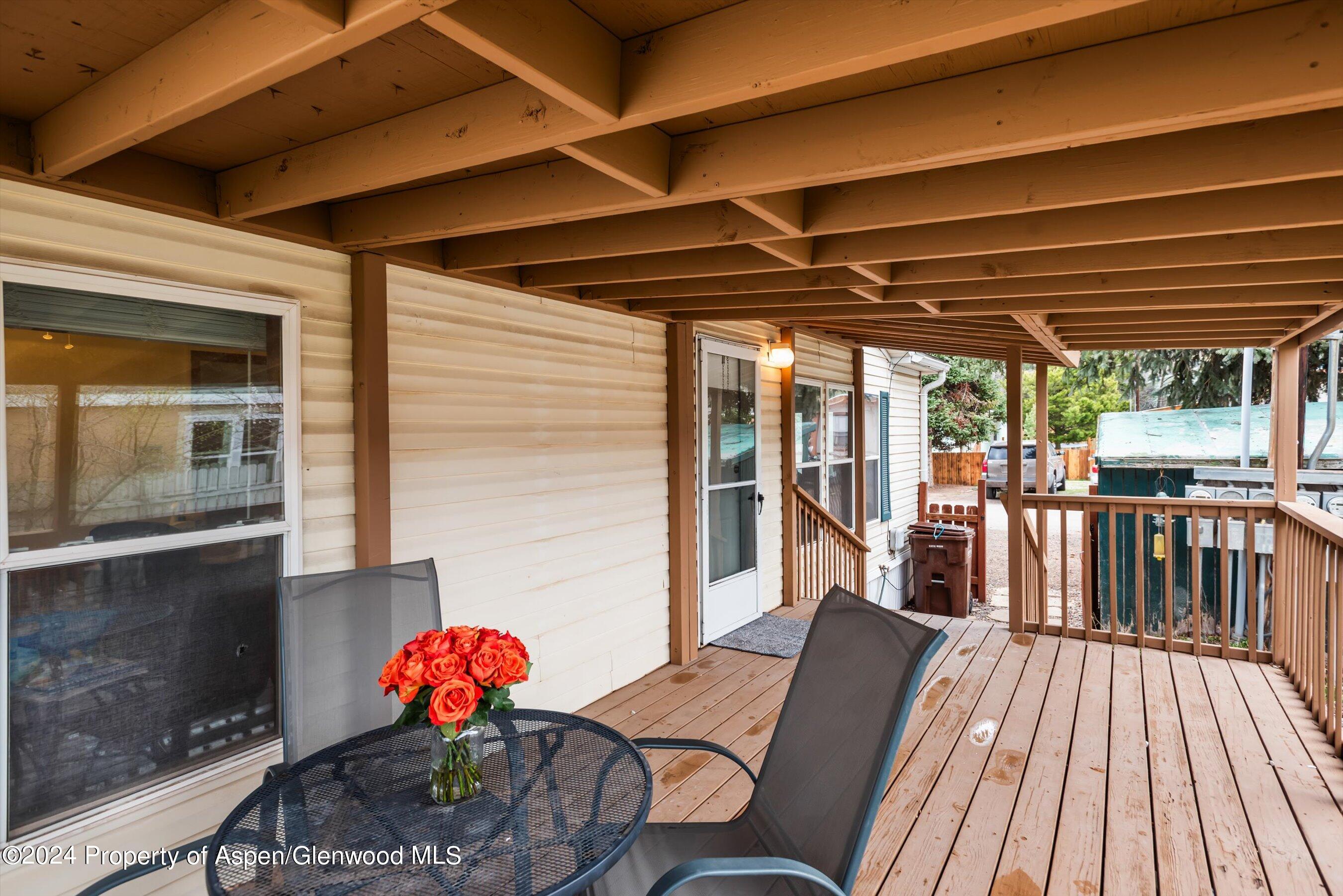 71 Nathan El Jebel, CO 81623 - Photo 27 of 29 a sitting area with furniture and wooden floor