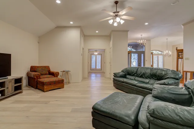 a kitchen with granite countertop cabinets and a stove top oven