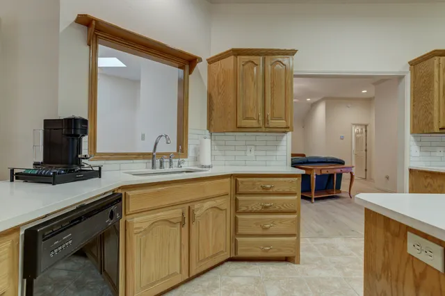 a view of a chandelier and window in a room