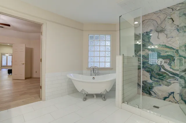 a bedroom with a bed and a table